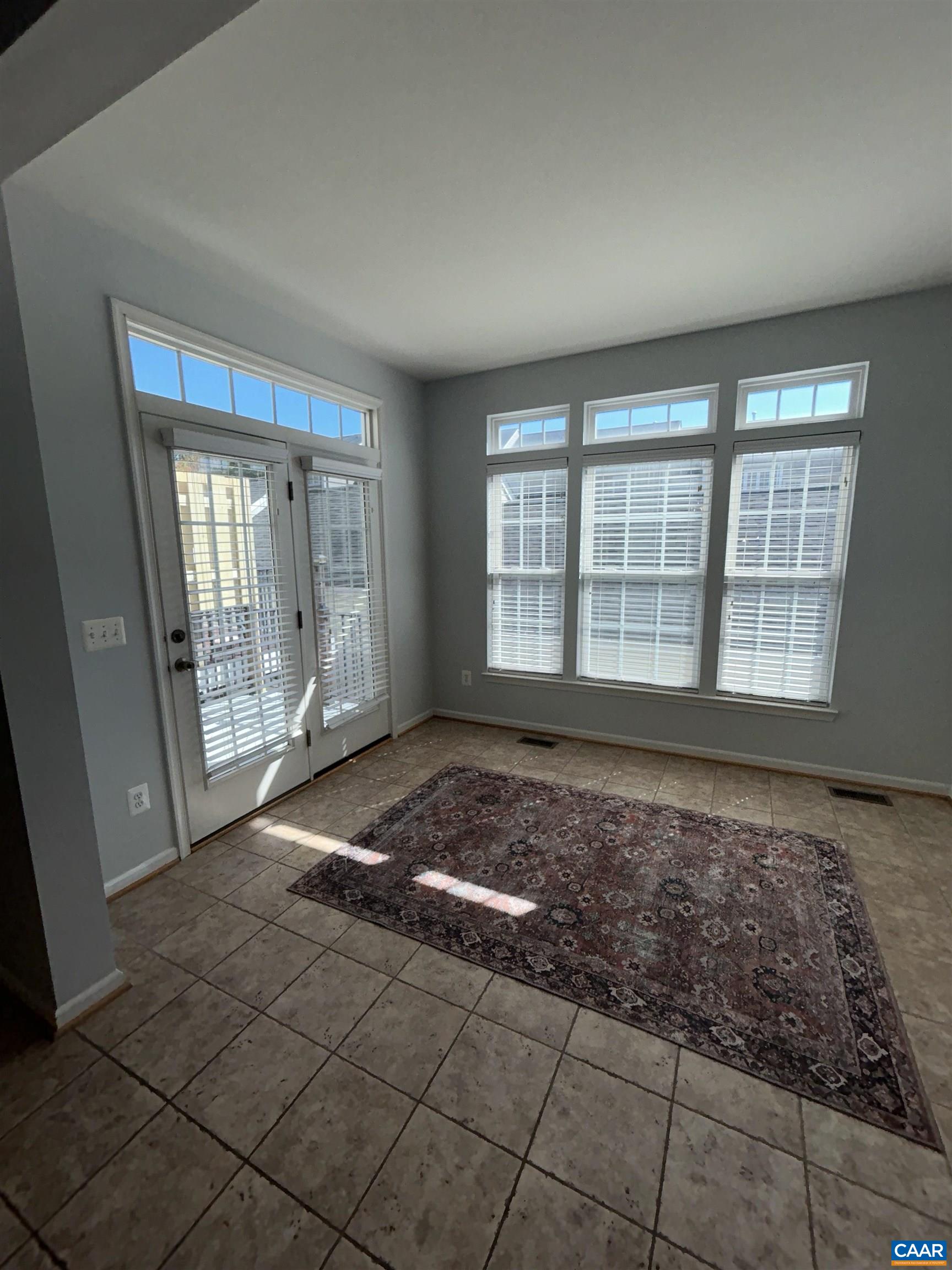 910 Rainier Road Charlottesville, VA 22903 - Photo 10 of 43 a view of an empty room with a window