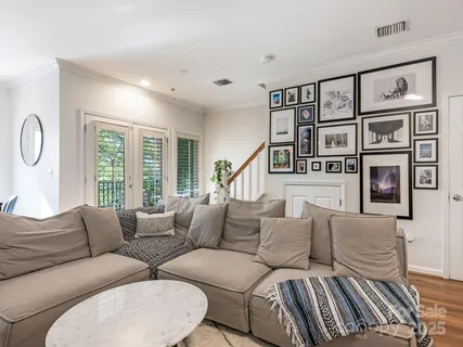 a living room with furniture or couch and a window