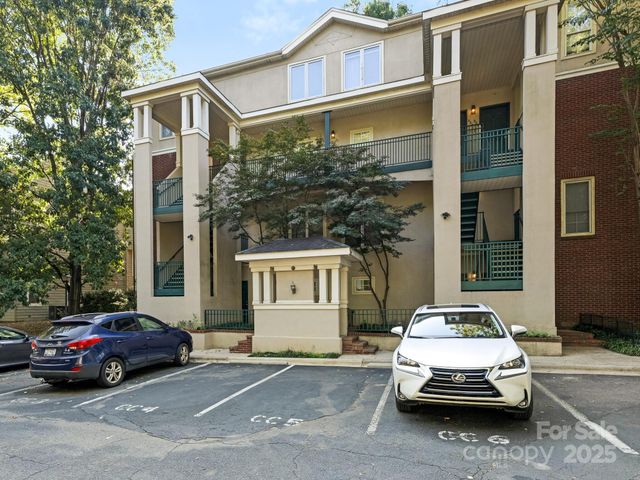 a car parked in front of a house