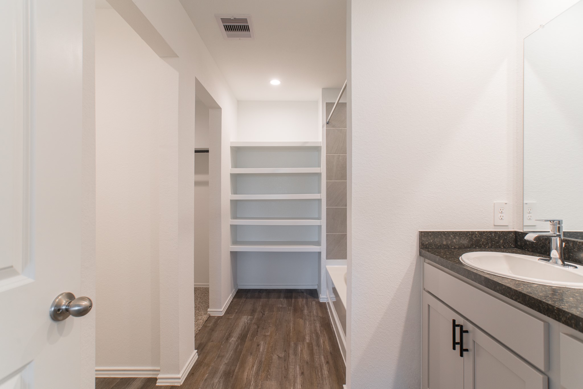 24314 Pebble Cres Lane Spring, TX 77373 - Photo 25 of 37 a bathroom with a sink and a mirror