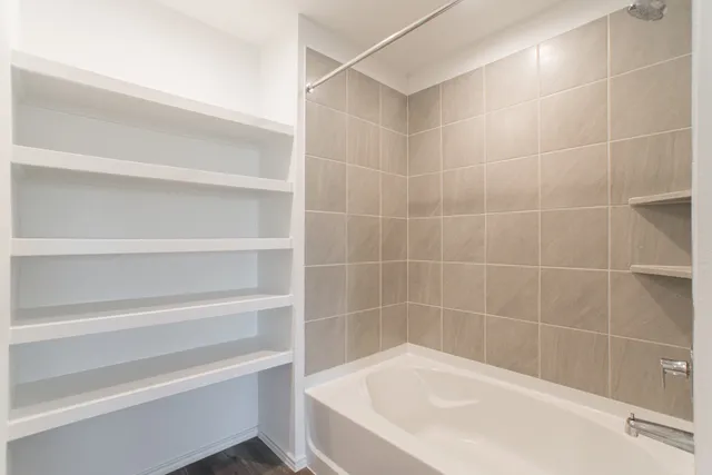 a view of a bathtub in a bathroom