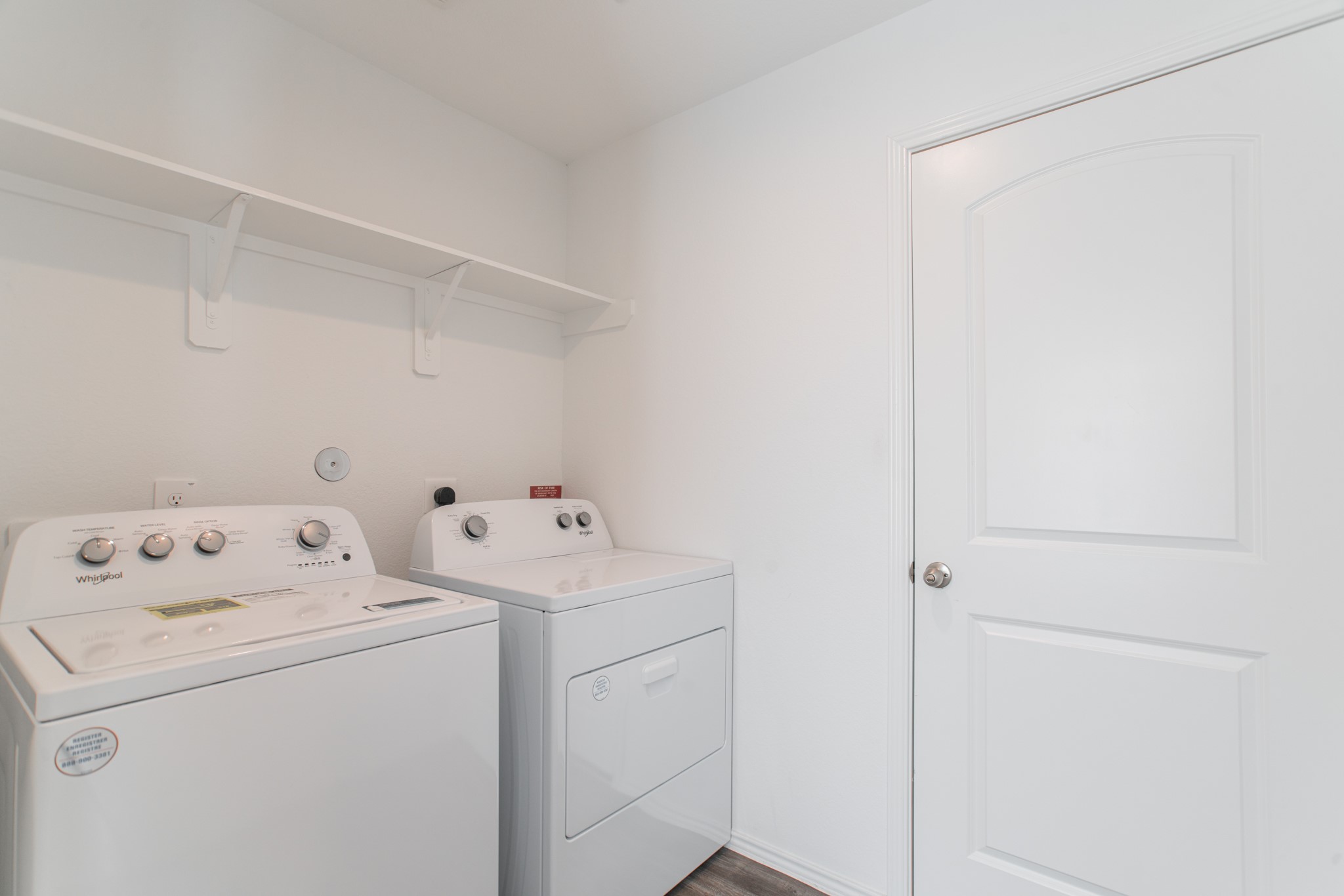 24314 Pebble Cres Lane Spring, TX 77373 - Photo 33 of 37 a view of storage and utility room with washer and dryer