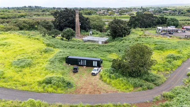 a view of a garden with an outdoor seating