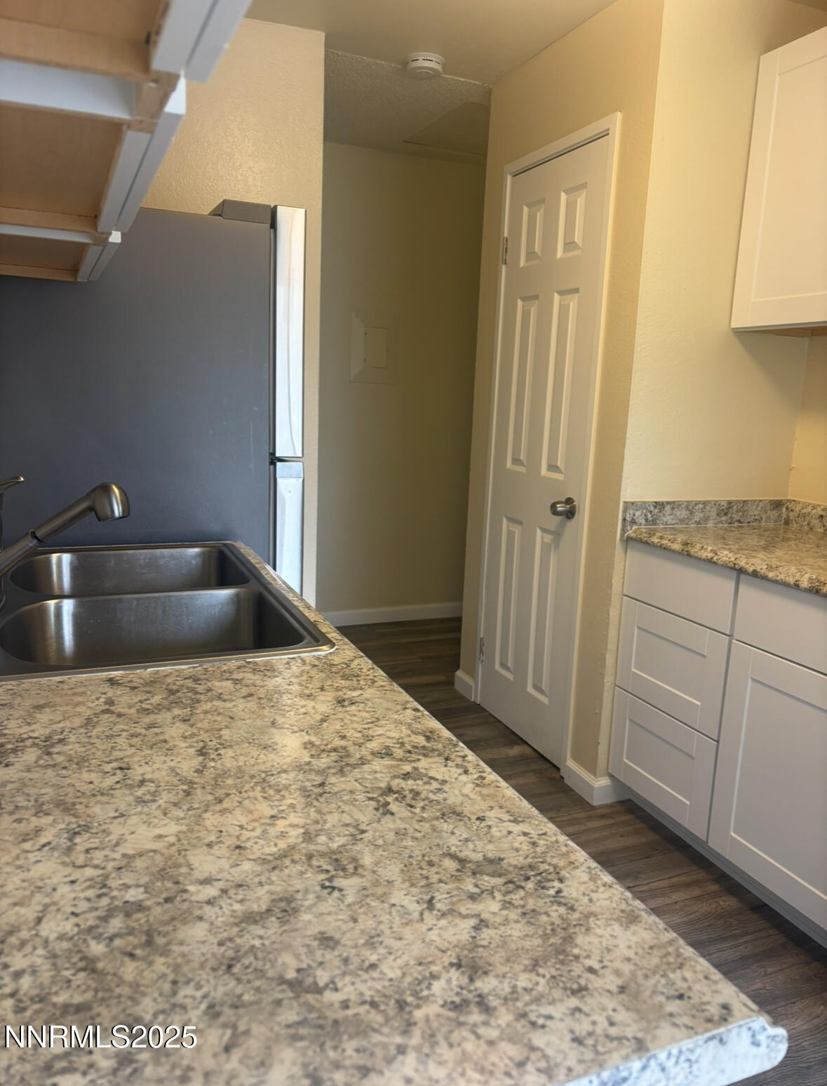 4604 Neil Road, Unit 114 Reno, NV 89502 - Photo 9 of 15 a bathroom with a sink and vanity