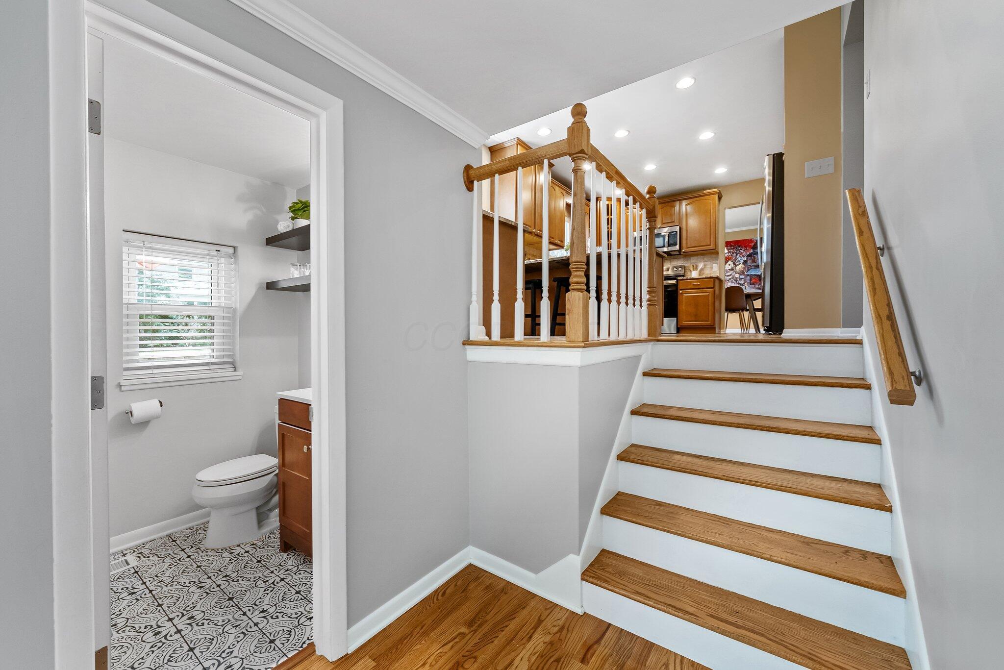 1269 Windham Road Columbus, OH 43220 - Photo 19 of 82 Half Bath and Stairs