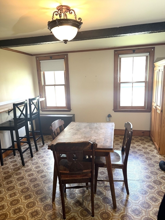 87 Ashfield Road Conway, MA 01341 - Photo 13 of 38 a view of a dining room with furniture and a window