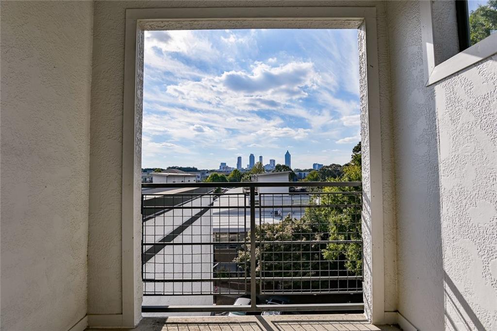 821 Ralph McGill Boulevard Northeast, Unit 2416 Atlanta, GA 30306 - Photo 2 of 44 a view of a balcony from a window