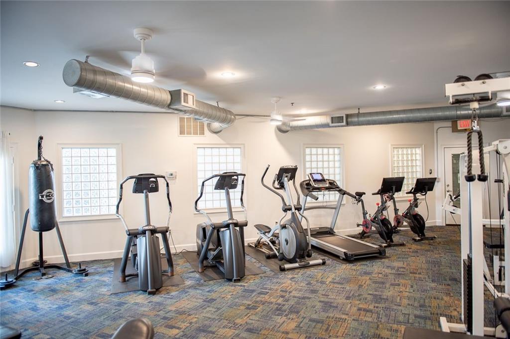 821 Ralph McGill Boulevard Northeast, Unit 2416 Atlanta, GA 30306 - Photo 38 of 44 a view of a room with gym equipment