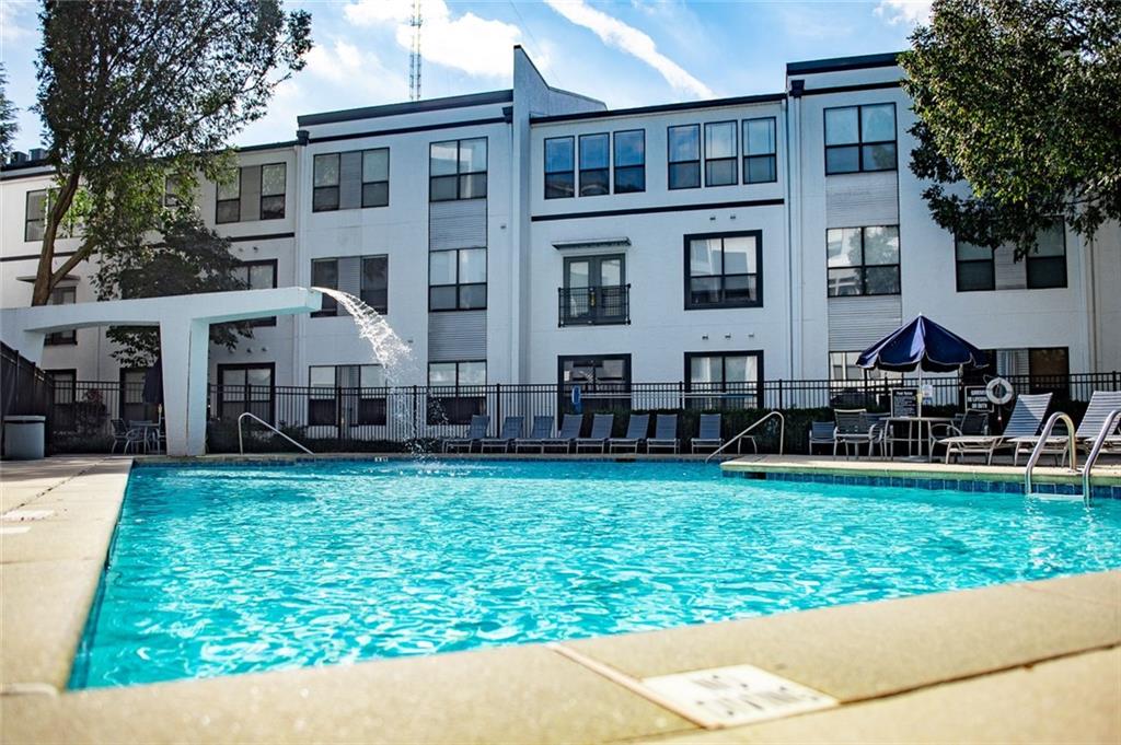 821 Ralph McGill Boulevard Northeast, Unit 2416 Atlanta, GA 30306 - Photo 39 of 44 a view of a house with a yard and sitting area