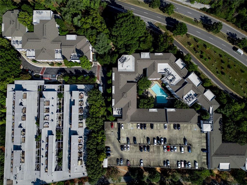 821 Ralph McGill Boulevard Northeast, Unit 2416 Atlanta, GA 30306 - Photo 44 of 44 an aerial view of multiple houses with yard