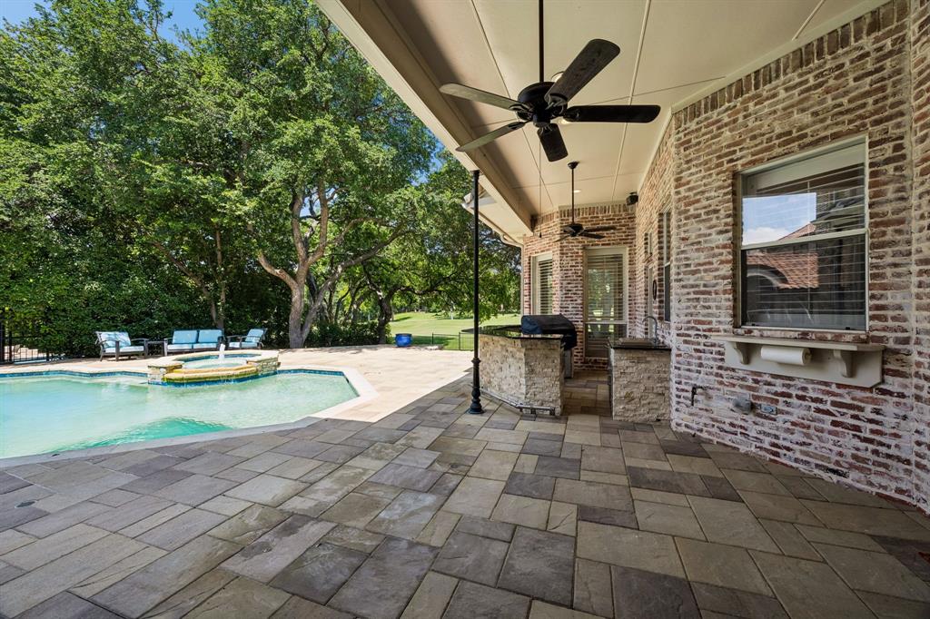 19 Windsor Ridge Frisco, TX 75034 - Photo 38 of 40 Pool, Covered Patio, and Outdoor Kitchen