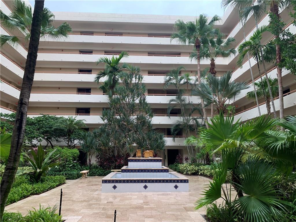 23200 Camino Del Mar, Unit 608 Boca Raton, FL 33433 - Photo 13 of 54 Walking into the Courtyard