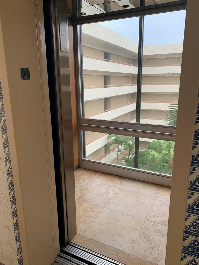 23200 Camino Del Mar, Unit 608 Boca Raton, FL 33433 - Photo 14 of 54 Glass Elevator