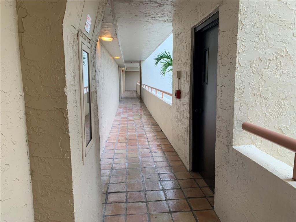 23200 Camino Del Mar, Unit 608 Boca Raton, FL 33433 - Photo 15 of 54 Walkway from Elevator