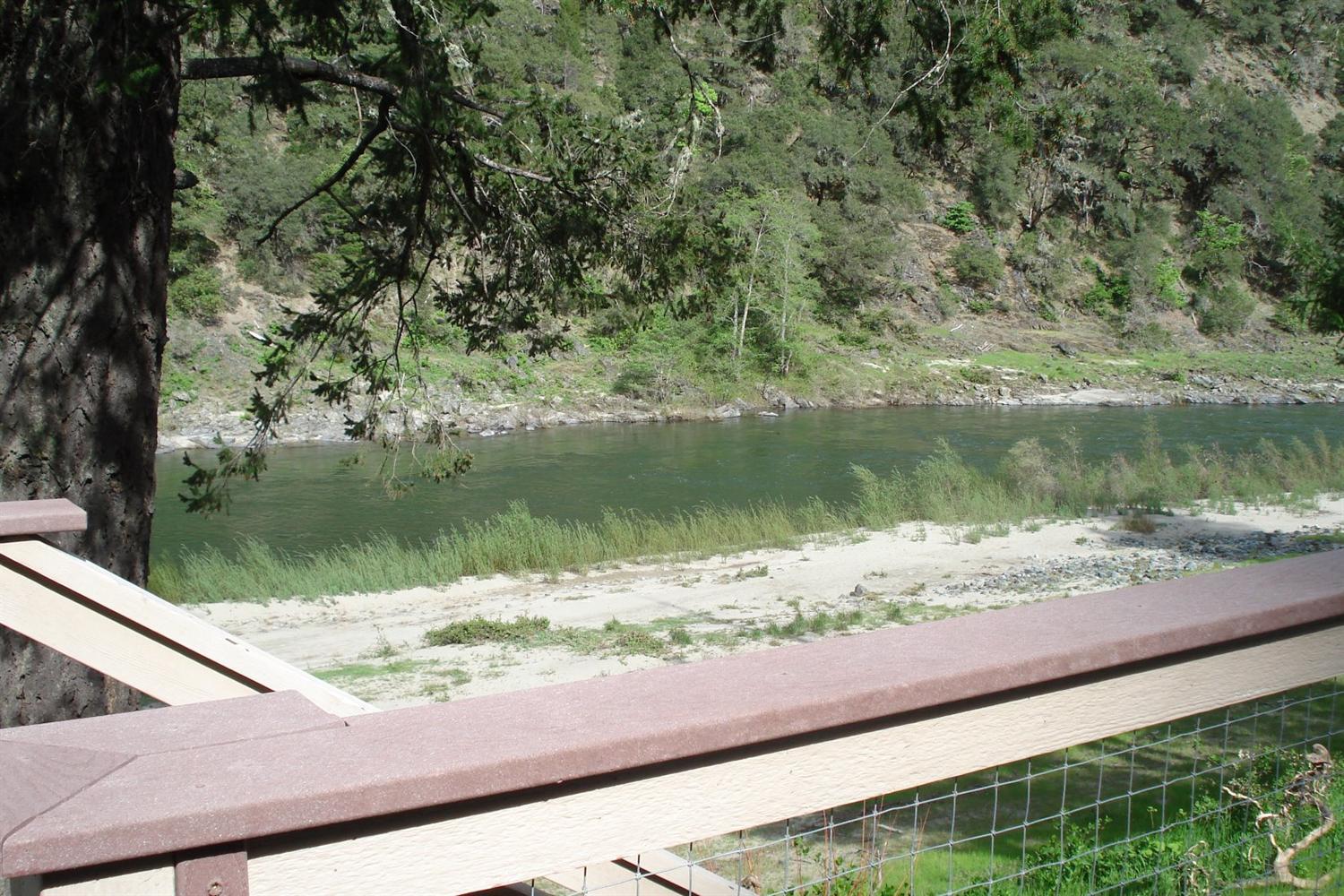 11800 Galice Road Merlin, OR 97532 - Photo 5 of 22 a view of a lake from a window