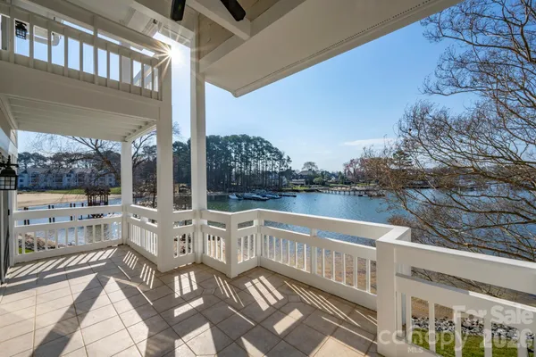 a view of balcony with furniture