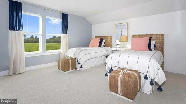 a bedroom with bed and window