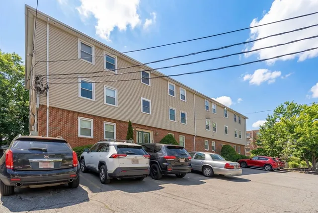 a car parked in front of a building
