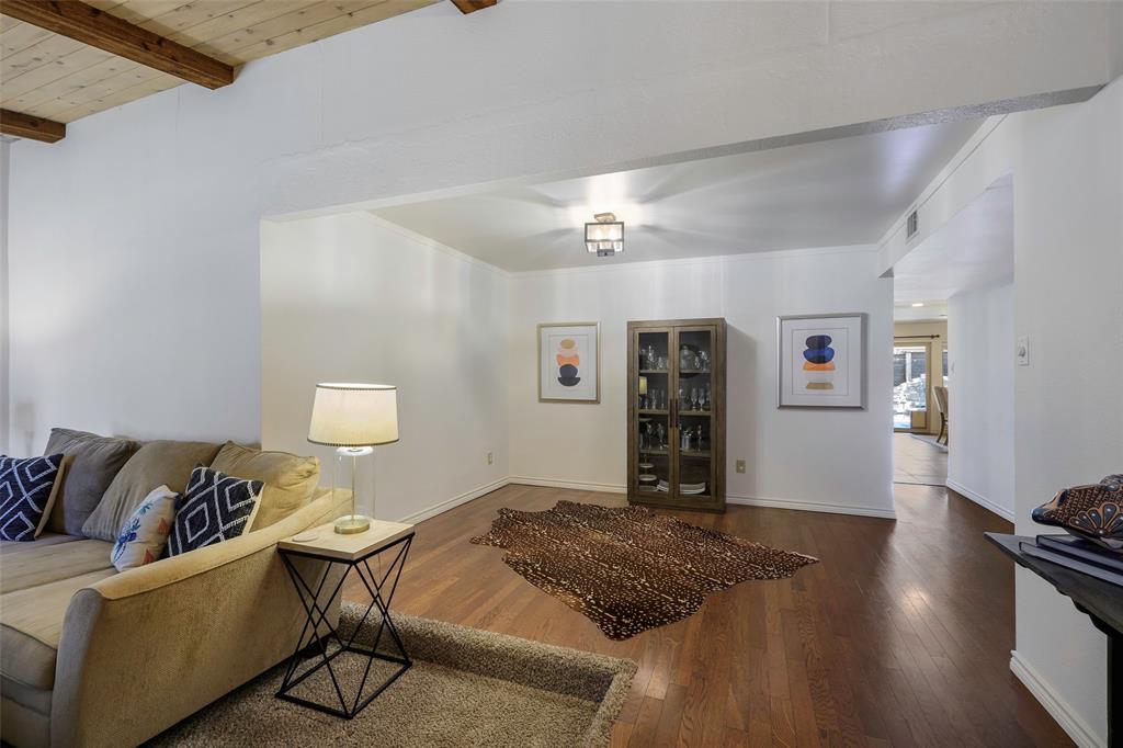 5810 Galaxie Road Garland, TX 75044 - Photo 33 of 33 a living room with furniture and wooden floor