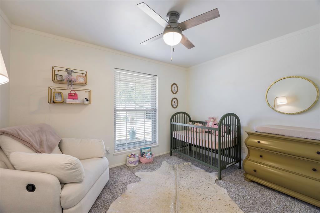 5810 Galaxie Road Garland, TX 75044 - Photo 21 of 33 a living room with furniture and a window