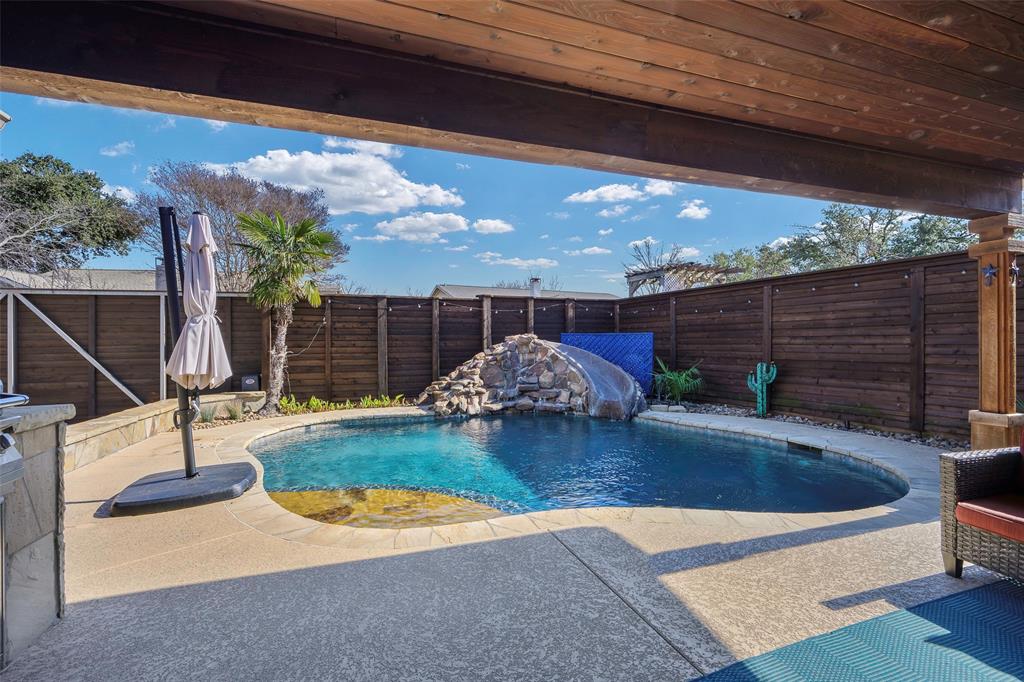 5810 Galaxie Road Garland, TX 75044 - Photo 22 of 33 a view of a backyard with sitting area