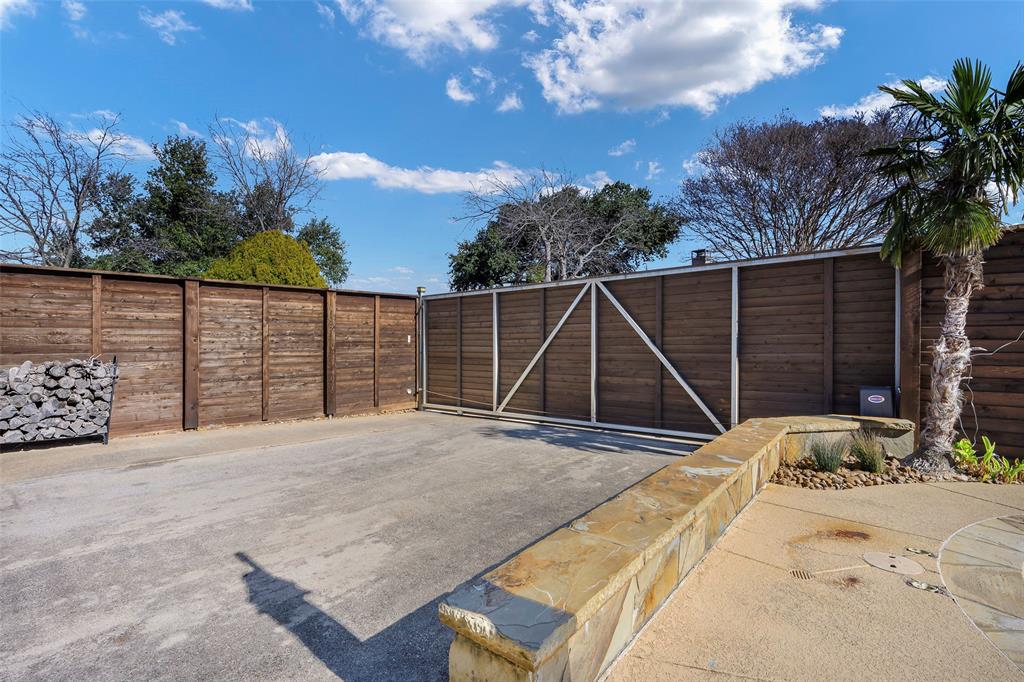 5810 Galaxie Road Garland, TX 75044 - Photo 23 of 33 a view of backyard with green space