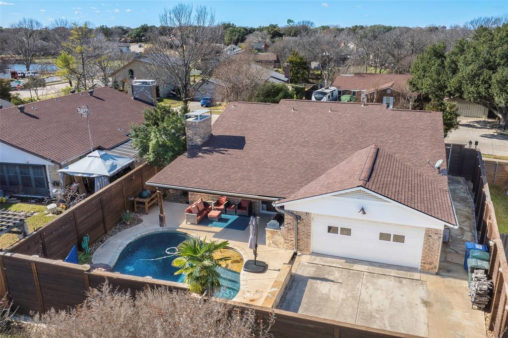 5810 Galaxie Road Garland, TX 75044 - Photo 25 of 33 an aerial view of a house with swimming pool and mountains
