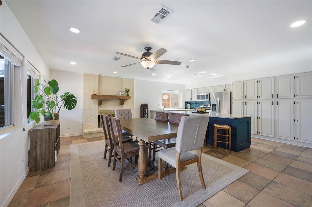 5810 Galaxie Road Garland, TX 75044 - Photo 7 of 33 a view of a dining room with furniture and a potted plant