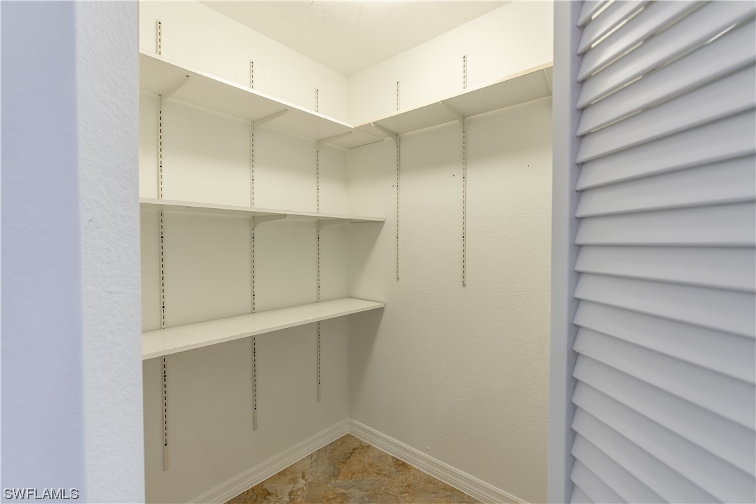 109 Audubon Road Naples, FL 34114 - Photo 9 of 41 a view of closet area