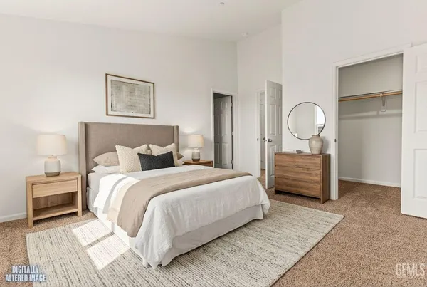 a bed room with a bed and a night stand