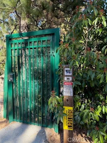 a sign that is sitting in front of a house