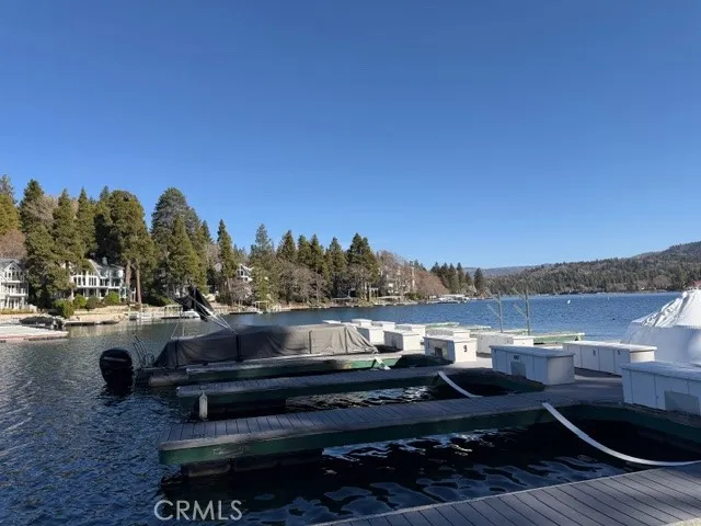 a terrace with outdoor seating and city view