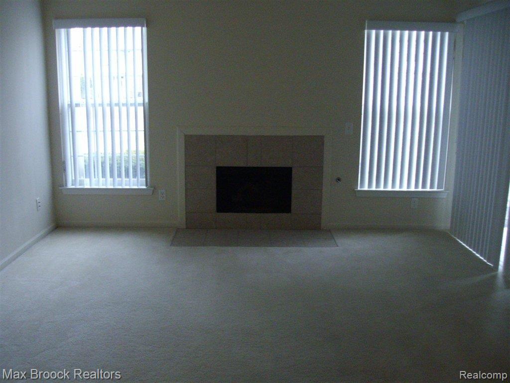5290 Brookemonte Circle, Unit 345 Rochester, MI 48306 - Photo 13 of 21 Living Rm wFP.JPG