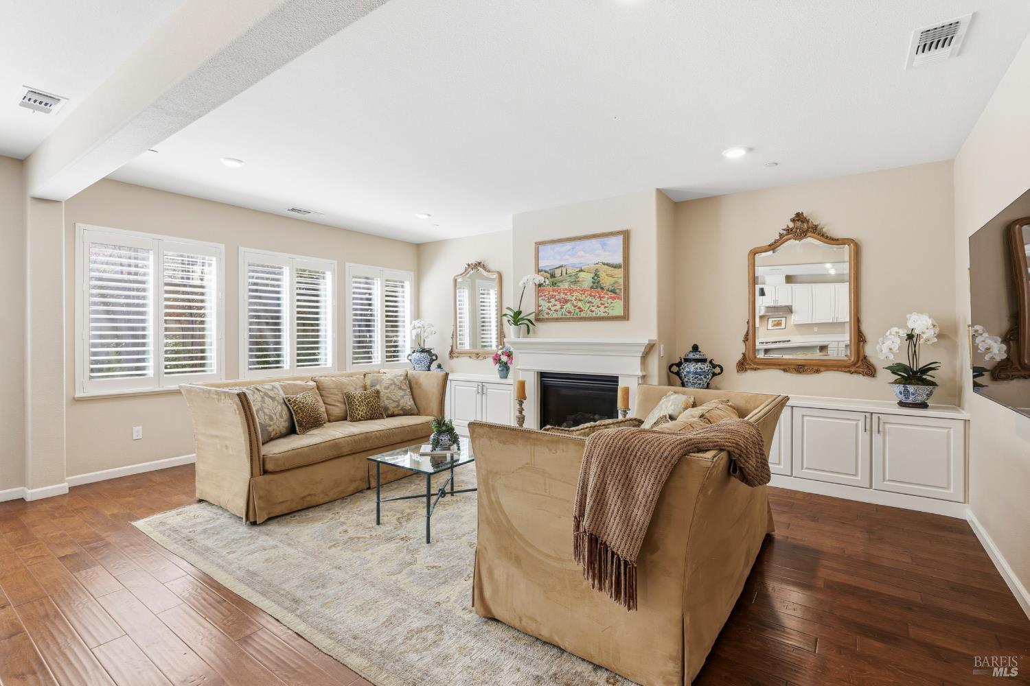 5533 Kennedy Place Rohnert Park, CA 94928 - Photo 10 of 63 a living room with furniture a fireplace and a large window