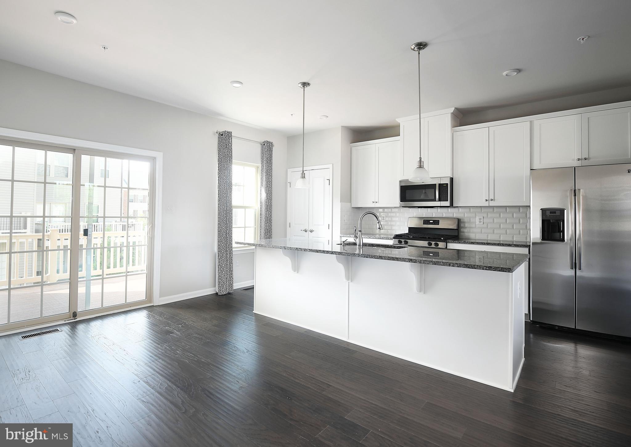 2929 Timberneck Way Hanover, MD 21076 - Photo 2 of 29 Kitchen Island with Sink and Seating