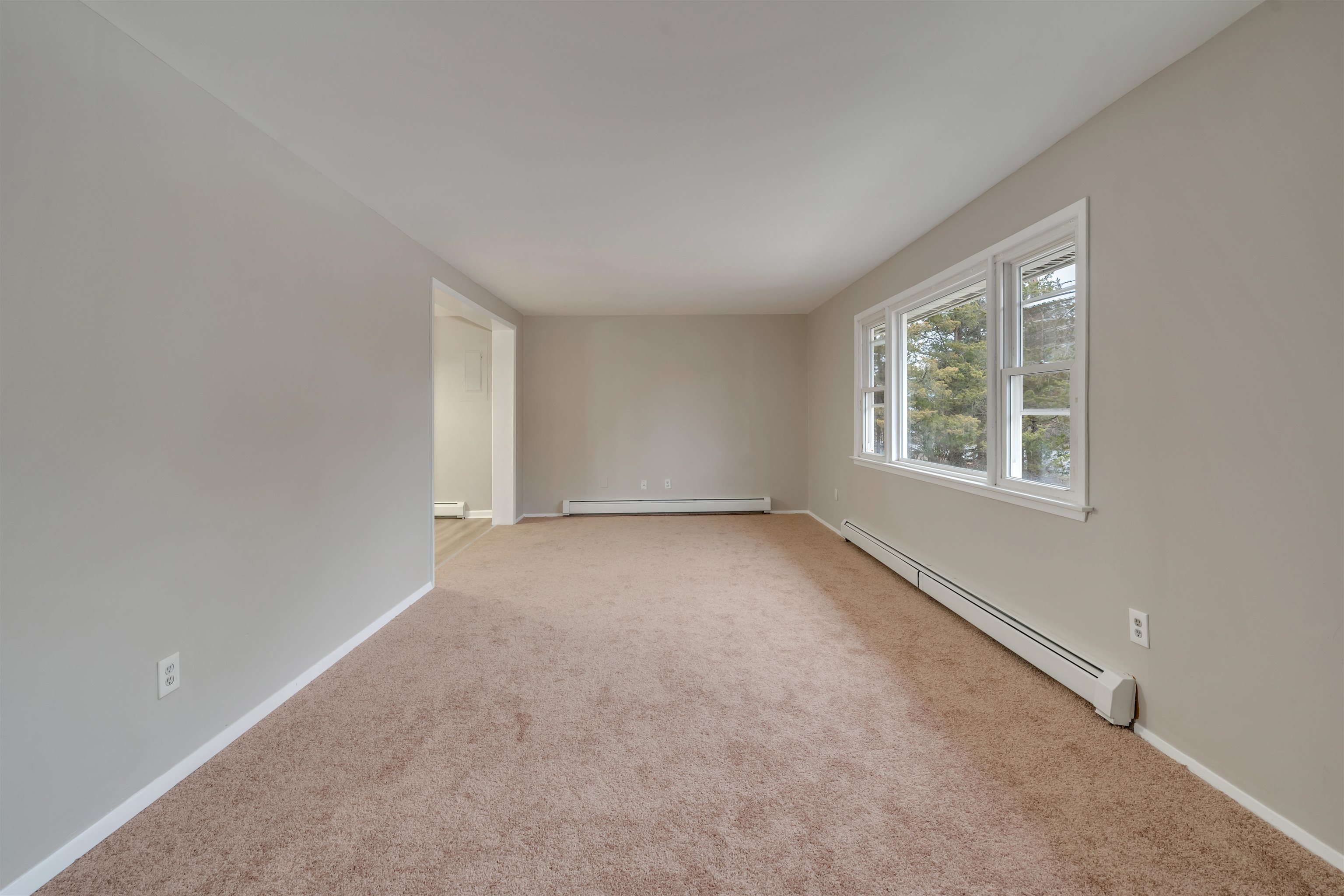 9 West Rising Sun Drive Ocean View, NJ 08230 - Photo 7 of 32 an empty room with windows