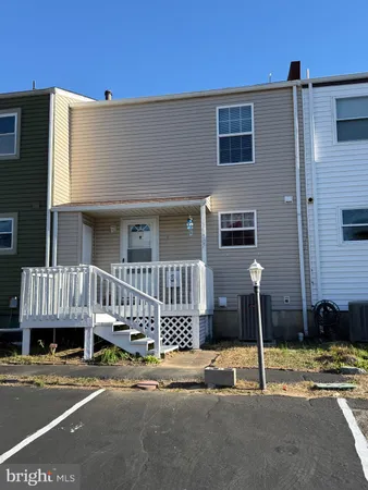 a view of a house with a patio