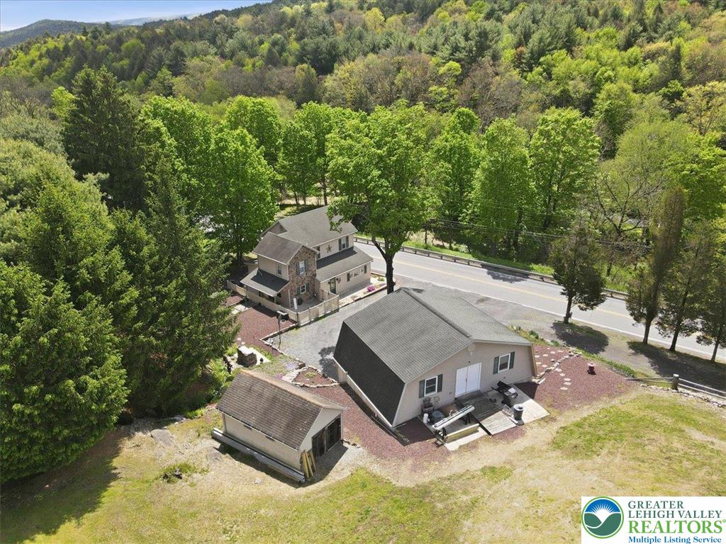 4880 Little Gap Road Kunkletown, PA 18058 - Photo 89 of 100 Perched on a verdant hillside, this property offers serene living amidst lush natural surroundings.