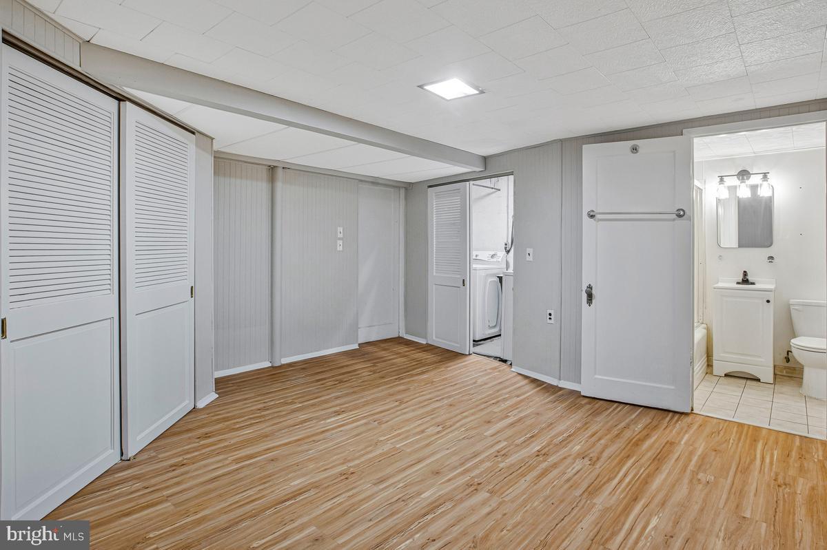 3040 Federal Street Baltimore, MD 21213 - Photo 30 of 41 a view of empty room with wooden floor
