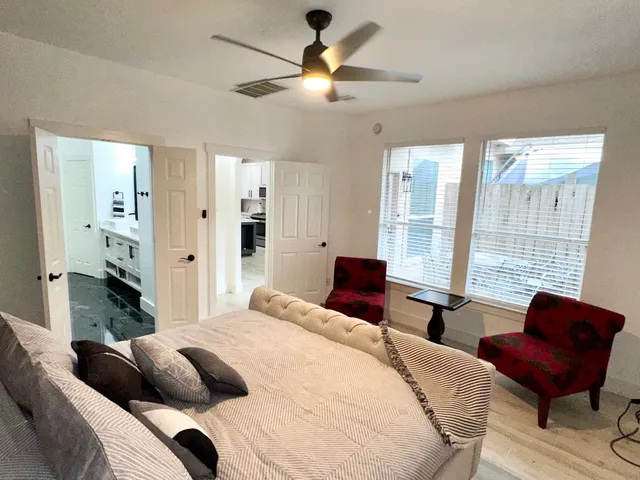 a bedroom with a bed and furniture