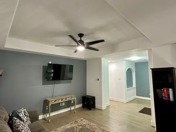 a view of a livingroom with a flat screen tv