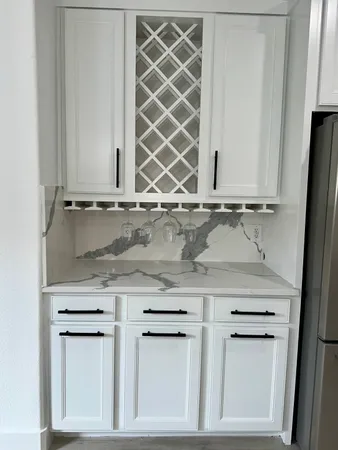 a view of cabinets and window