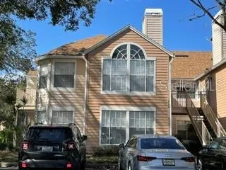 a front view of a house with parking