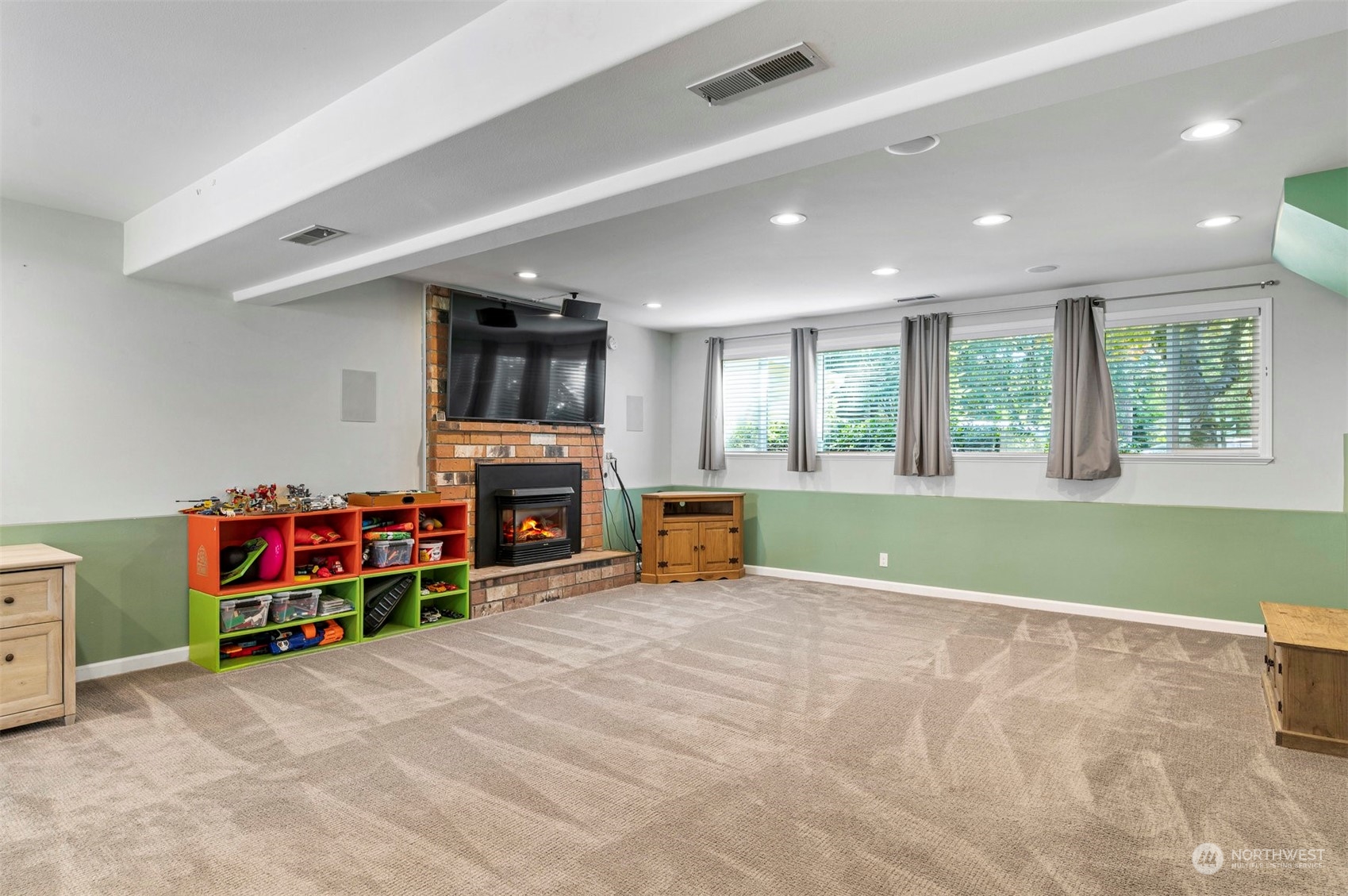2425 166th Place Southeast Bothell, WA 98012 - Photo 24 of 39 a view of a livingroom with furniture and a fireplace