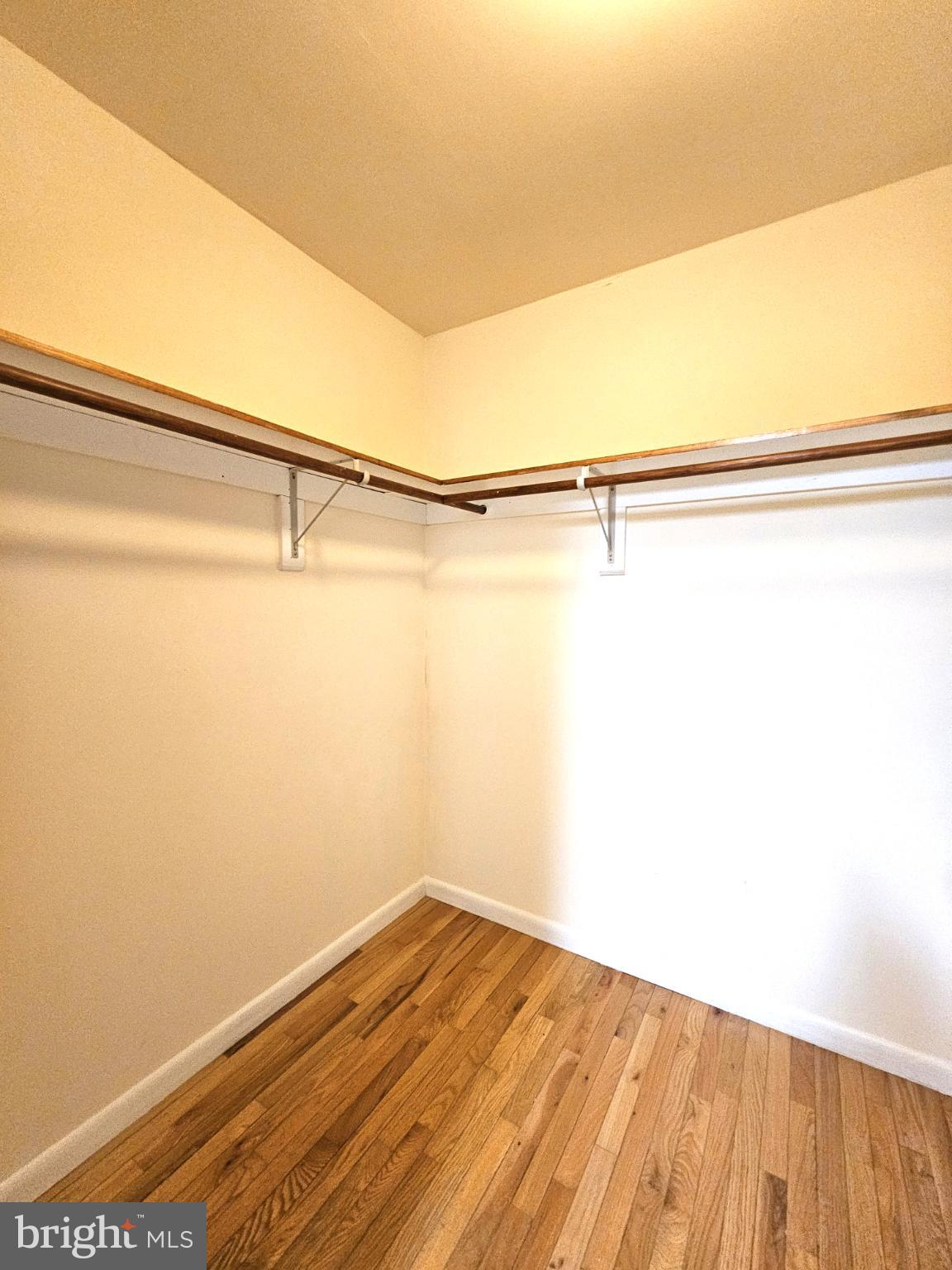 809 Hanson Street, Unit A Salisbury, MD 21801 - Photo 6 of 11 Spacious closet with warm wooden floors.