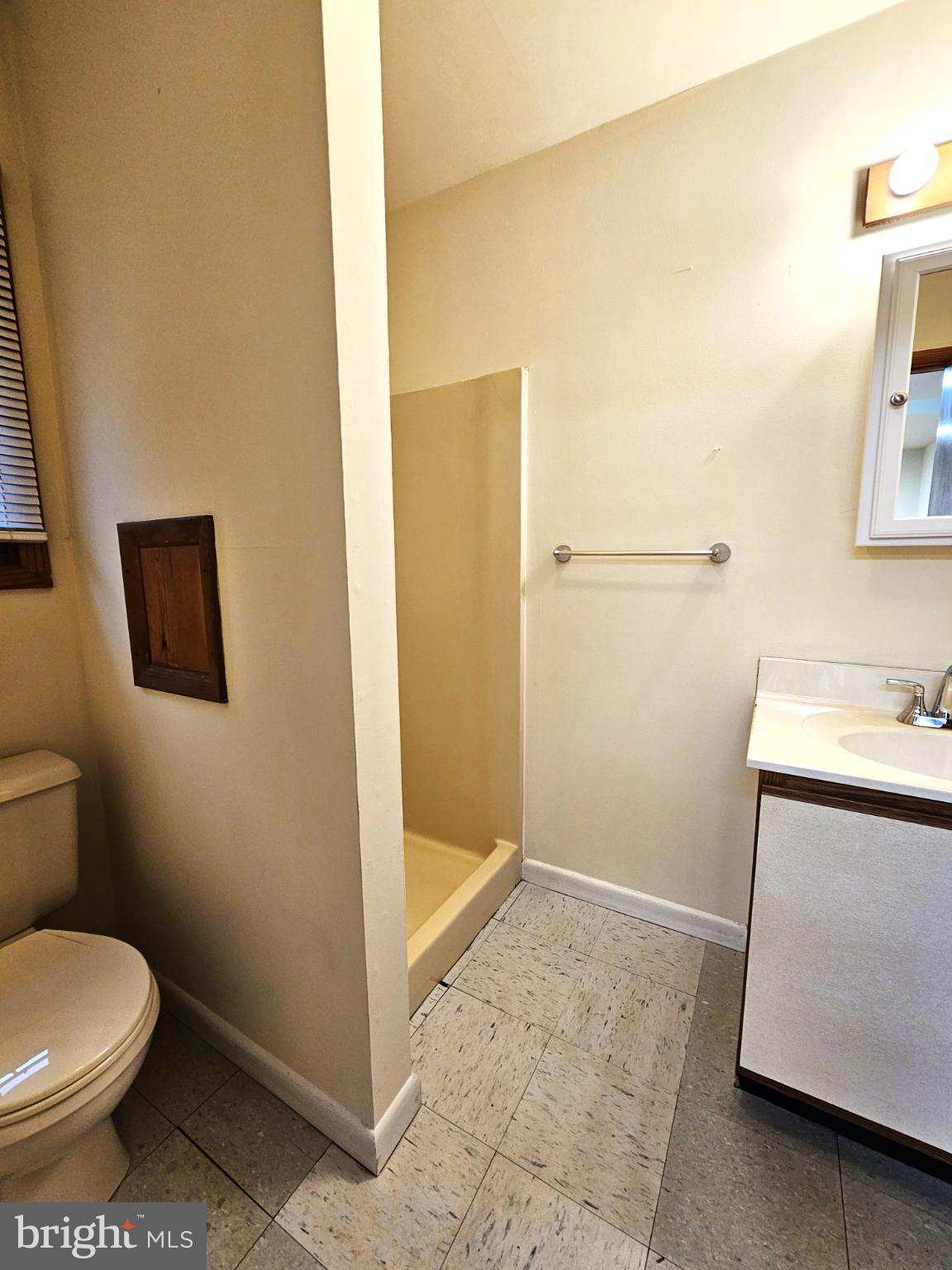 809 Hanson Street, Unit A Salisbury, MD 21801 - Photo 8 of 11 Bright and functional bathroom space.