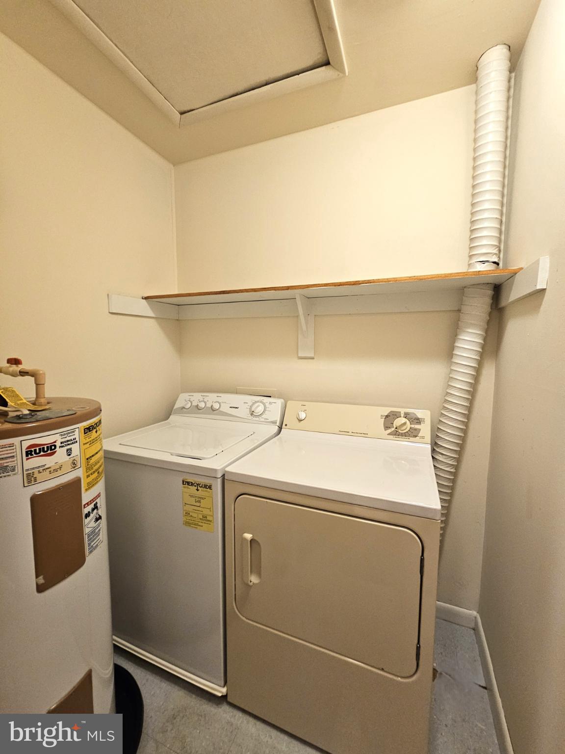 809 Hanson Street, Unit A Salisbury, MD 21801 - Photo 9 of 11 Efficient laundry space with essential appliances.