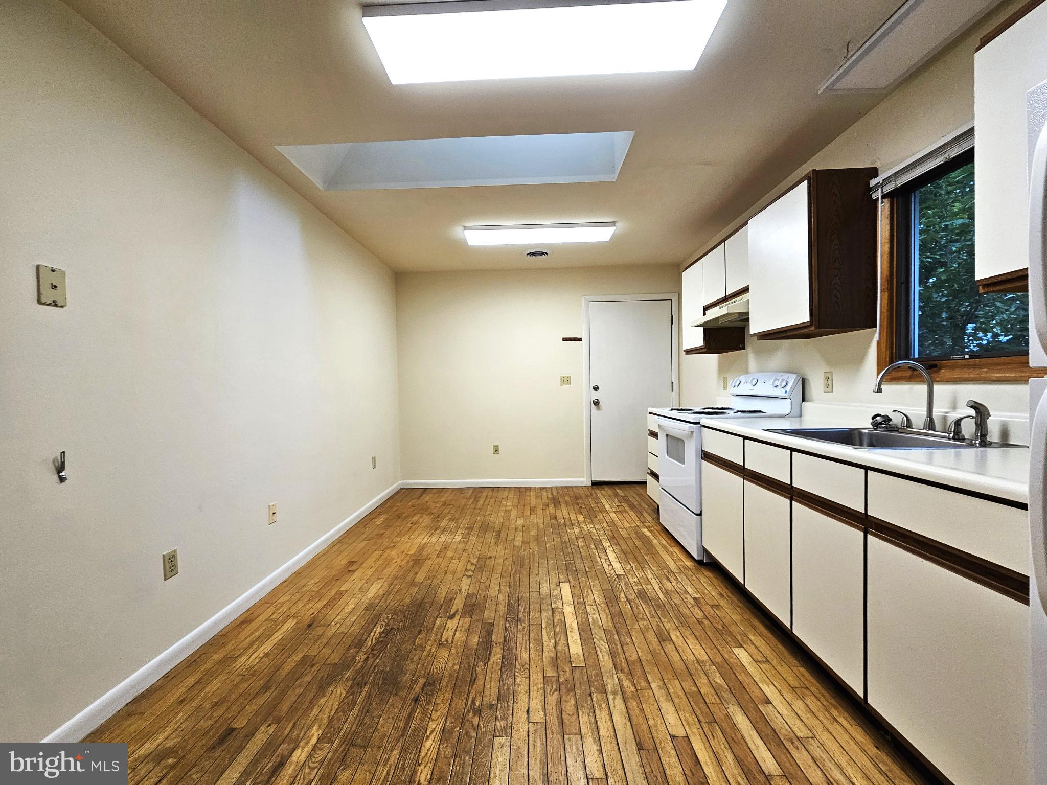 809 Hanson Street, Unit A Salisbury, MD 21801 - Photo 10 of 11 Spacious kitchen with natural light.