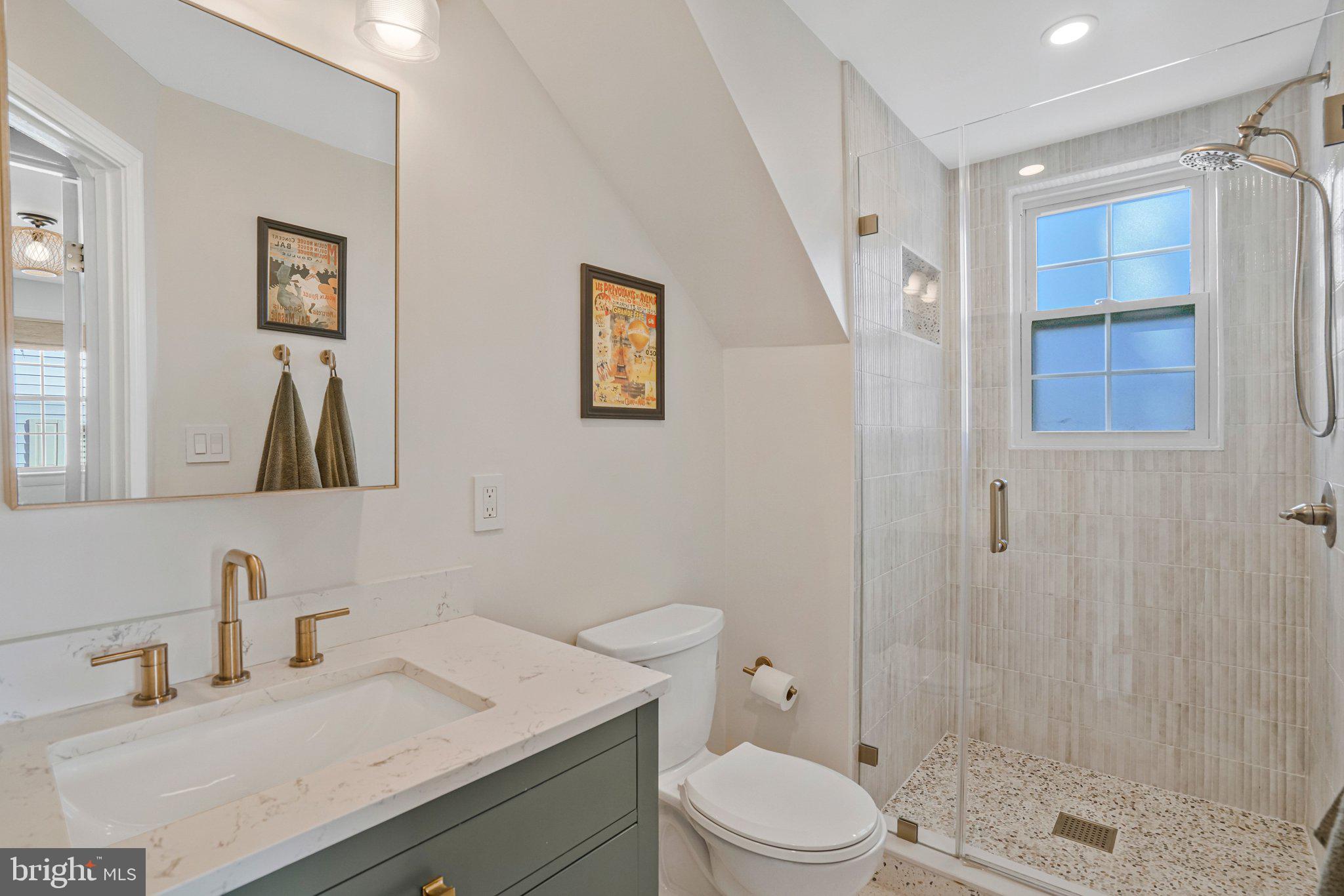 4140 21st Road North Arlington, VA 22207 - Photo 22 of 30 a bathroom with a sink a toilet and shower