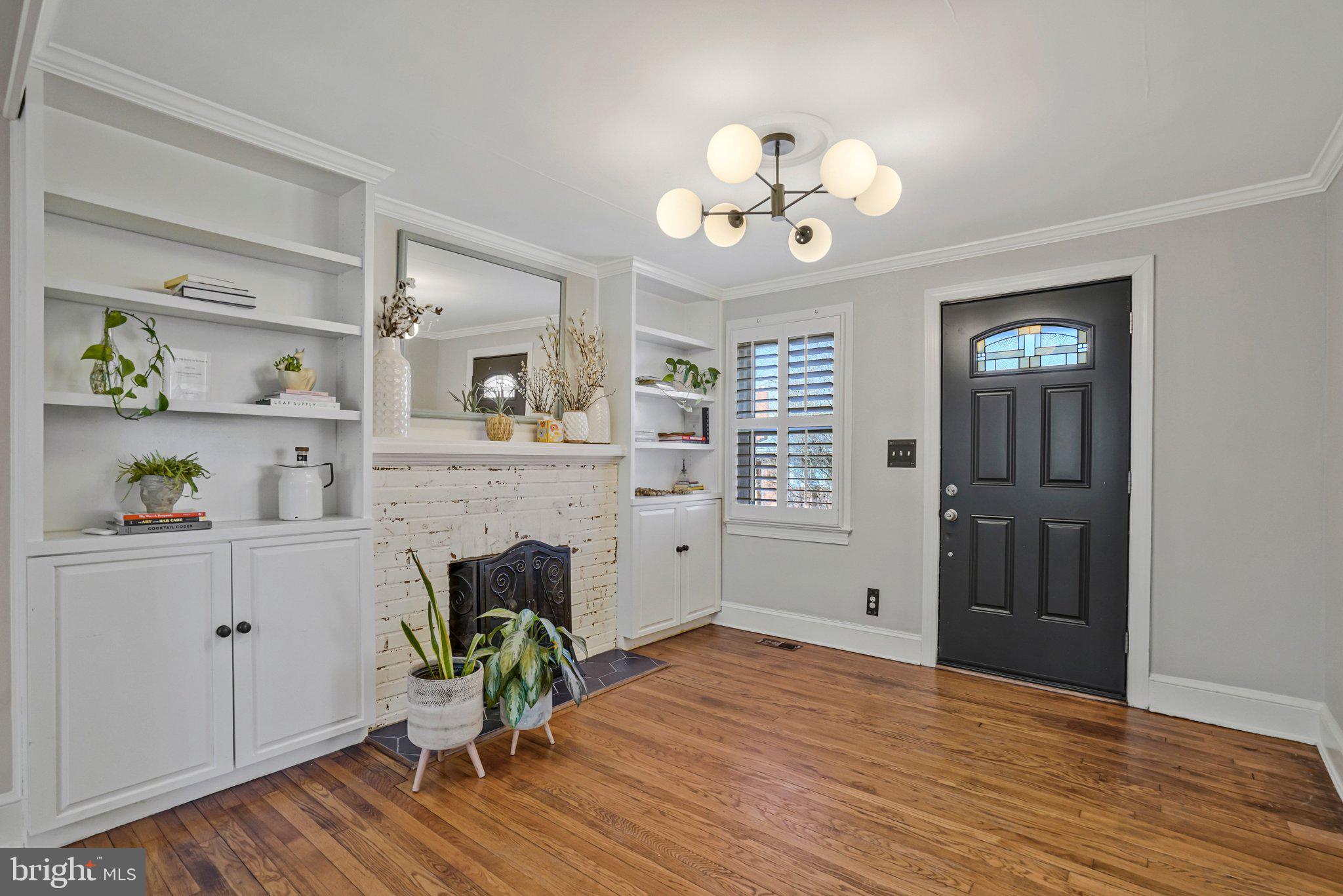 4140 21st Road North Arlington, VA 22207 - Photo 6 of 30 a view of a livingroom with furniture wooden floor and a ceiling fan